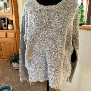 Quinn women’s size M sweater, gray crewneck, back is longer than front.